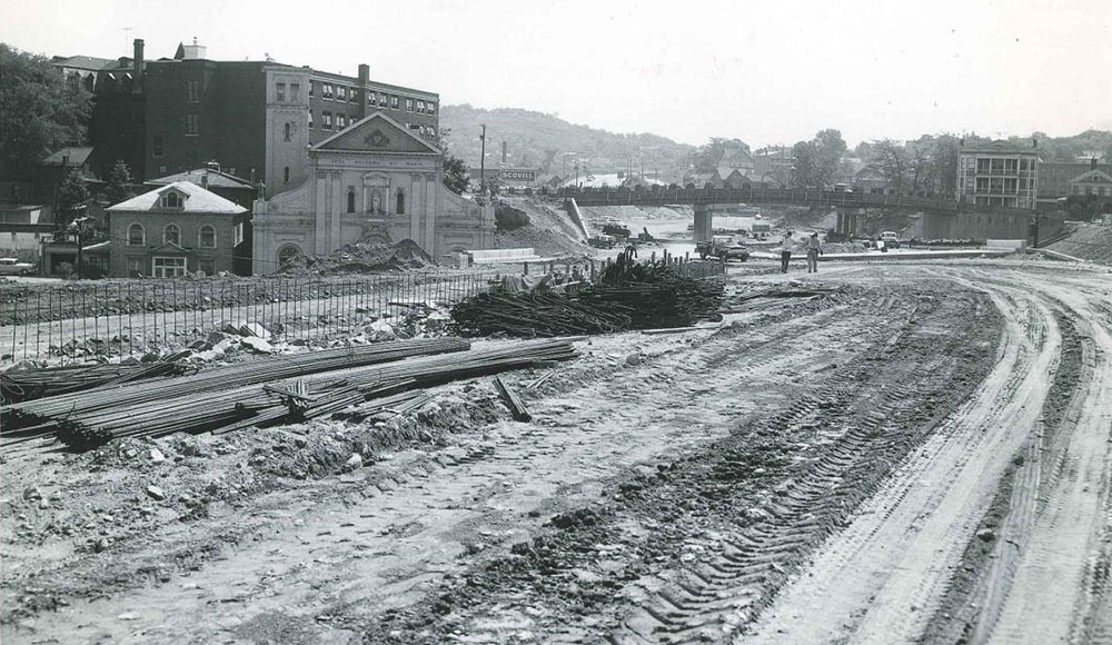 Looking east at what is now I-84 with a view of the South Elm Street bridge. (MAY 28, 1965)