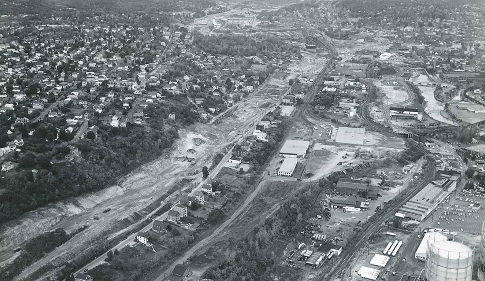 Looking north along Route 8, the Charles Street retaining wall excavation is centered in this picture. (OCT 05, 1965)